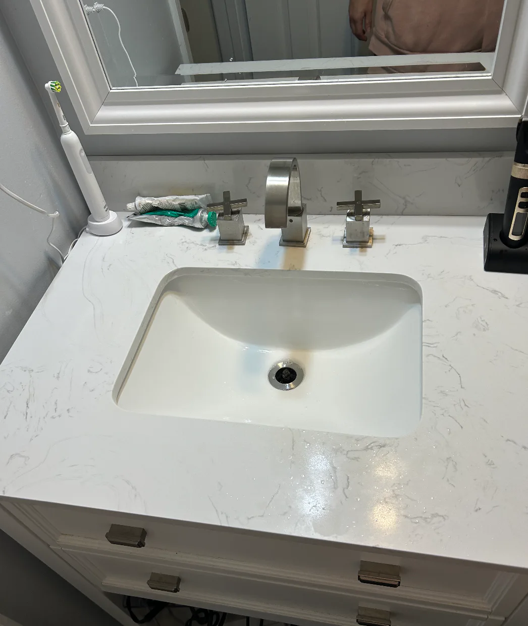 The same bathroom sink and vanity after Kleaning360 cleaning